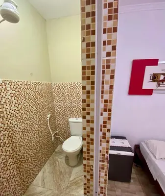 Uma casa de banho em Cata residence