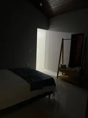 Uma cama ou camas num quarto em Chalé Casa Moitas