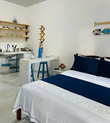 Uma cama ou camas num quarto em Suite Santorini Jericoacoara