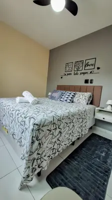 Uma cama ou camas num quarto em Mar e Aconchego próx ao Beach Parck e FioCruz