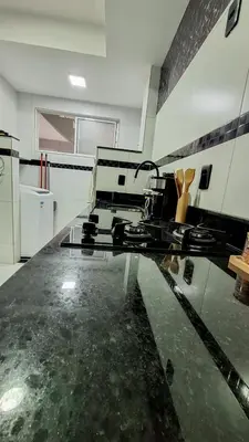 A cozinha ou kitchenette de Mar e Aconchego próx ao Beach Parck e FioCruz