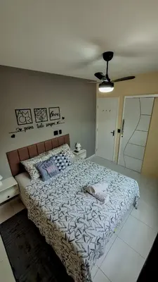 Uma cama ou camas num quarto em Mar e Aconchego próx ao Beach Parck e FioCruz