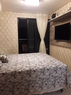 Uma cama ou camas num quarto em Maravilhoso Apartamento na Beira Mar