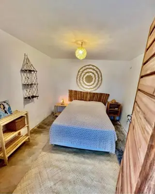 Uma cama ou camas num quarto em Casa Sereia Icapuí