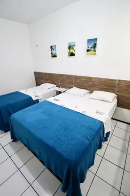 Uma cama ou camas num quarto em Apartamento Mobiliado AptCE