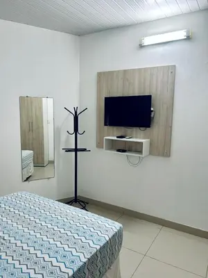 Uma televisão e/ou sistema de entretenimento em ALMEIDA Flats - Ibicuitaba
