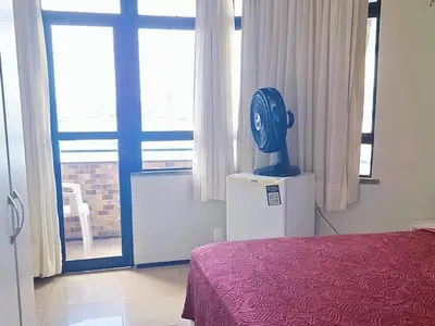 Uma cama ou camas num quarto em Golden Fortaleza