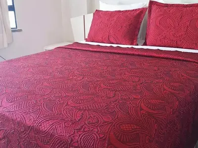 Uma cama ou camas num quarto em Golden Fortaleza