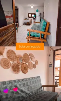 Uma área de estar em Ondas do mar Taiba Residence