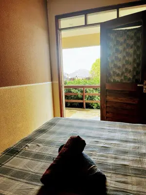 Uma cama ou camas num quarto em Ondas do mar Taiba Residence