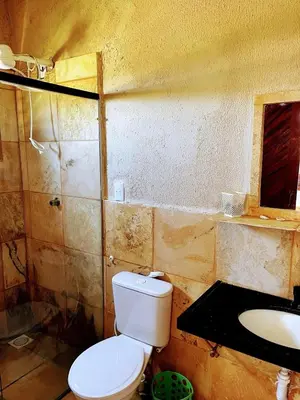 Uma casa de banho em Ondas do mar Taiba Residence