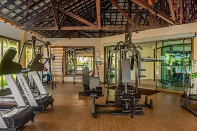 O centro de fitness e/ou as comodidades de fitness de VG Sun #109 - Apartamento em Cumbuco by Carpediem