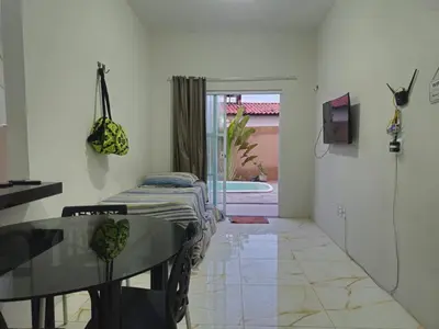 Uma televisão e/ou sistema de entretenimento em Casa Recanto dos ventos-espaço inteiro-Barra nova -Cascavel-CE