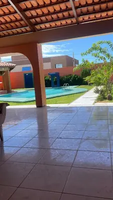 A piscina em ou perto de Duplex à 800 mts do Beach Park COM 5 suítes