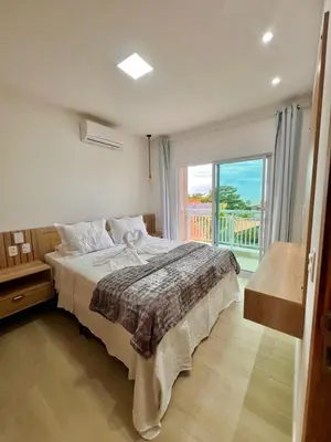 Uma cama ou camas num quarto em Del Mar SG Apartment