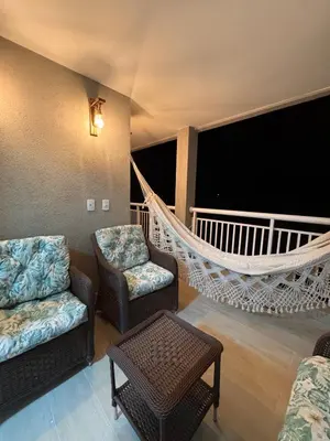 Uma área de estar em Del Mar SG Apartment