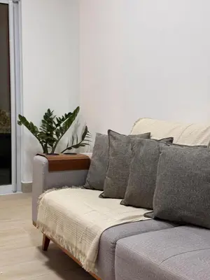 Uma área de estar em Del Mar SG Apartment