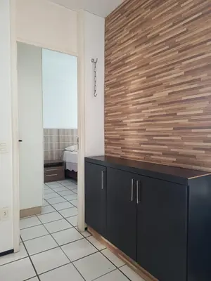 Uma cama ou camas num quarto em Apartamento praia de Iracema Fortaleza