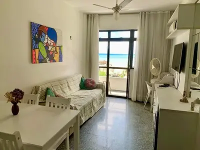 Uma cama ou camas num quarto em Flat Vista Mar em Área Nobre com Piscina na Beira Mar
