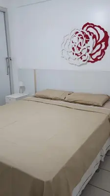 Uma cama ou camas num quarto em Flat Vista Mar em Área Nobre com Piscina na Beira Mar