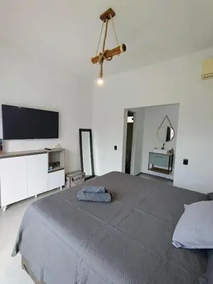 Uma televisão e/ou sistema de entretenimento em KaBeat House Icaraizinho