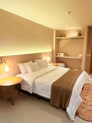 Uma cama ou camas num quarto em Eagle Boutique Hotel