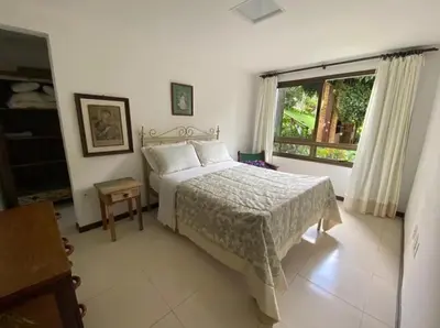Uma cama ou camas num quarto em Condomínio Monteflor Guaramiranga