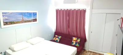Uma cama ou camas num quarto em Hotel Tabajara Apto 406