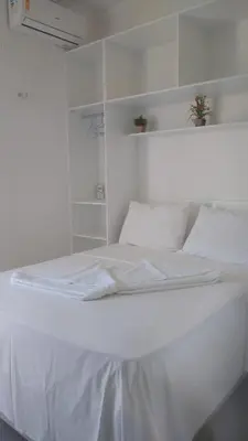 Uma cama ou camas num quarto em Apto Flecheiras 06