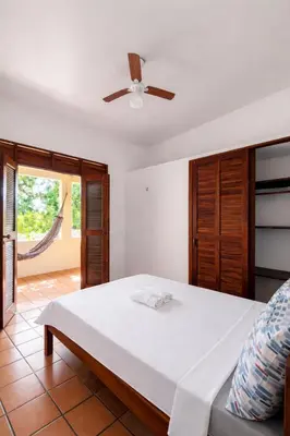 Uma cama ou camas num quarto em Maison Tropical