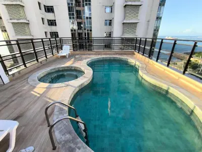 A piscina em ou perto de Apê de 2 quartos reformado e decorado a 100m da Beira Mar