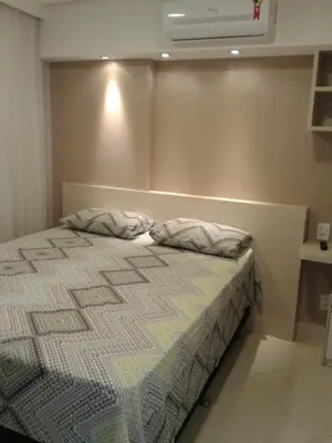 Uma cama ou camas num quarto em Beleza a beira-mar de fortaleza