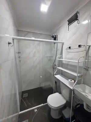 Uma casa de banho em Flat com vista mar na orla