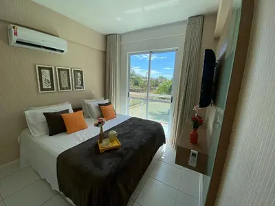 Uma cama ou camas num quarto em Apto. Palm Beach, 300M Beach Park