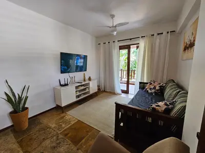 Uma televisão e/ou sistema de entretenimento em Brisa Cumbuco - Apê na Praia