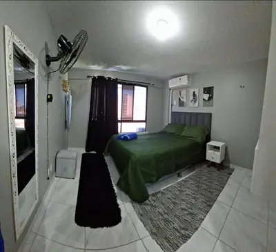 Uma cama ou camas num quarto em Apartamento em cond na Praia do Futuro com 2 suítes