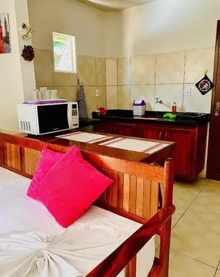 A cozinha ou kitchenette de Pousada Triplex Pôr Do Sol