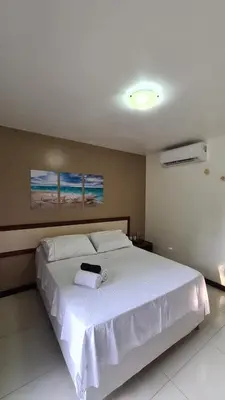 Uma cama ou camas num quarto em Eco Paradise Cumbuco 216