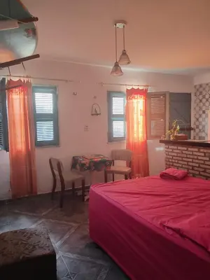 Uma cama ou camas num quarto em Studio aconchegante cumbuco