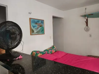 Uma cama ou camas num quarto em Studio aconchegante cumbuco