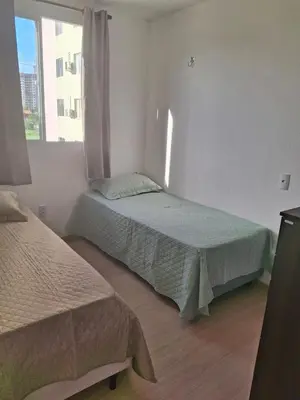 Uma cama ou camas num quarto em Ap 2 quartos ,condomínio mirante clube