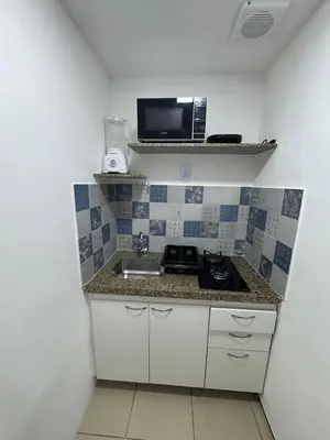 A cozinha ou kitchenette de Praia Mansa Suite Hotel Flat