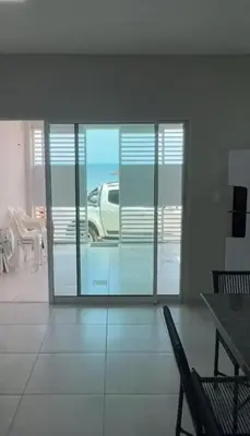 Uma área de estar em Casa do Airton