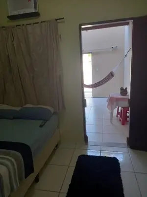 Uma cama ou camas num quarto em Kitnet