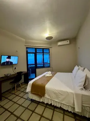 Uma cama ou camas num quarto em 951A Golden flat Fortaleza