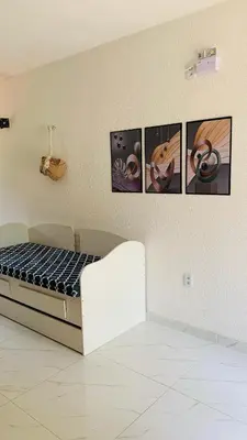 Uma cama ou camas num quarto em Chalè Pico Alto