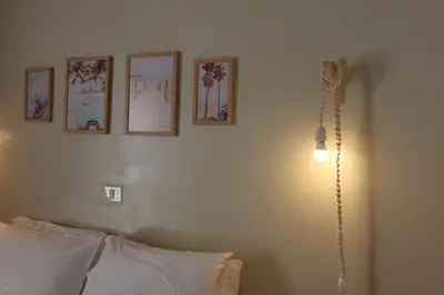 Uma cama ou camas num quarto em Vila Goa Beira Mar - Prea