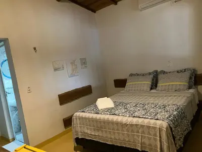 Uma cama ou camas num quarto em Vila Goa Beira Mar - Prea