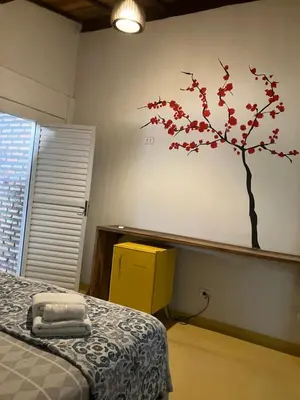 Uma cama ou camas num quarto em Vila Goa Beira Mar - Prea