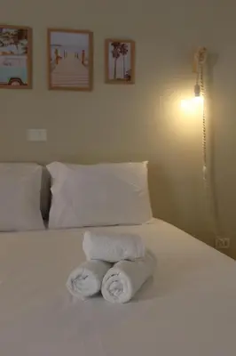 Uma cama ou camas num quarto em Vila Goa Beira Mar - Prea